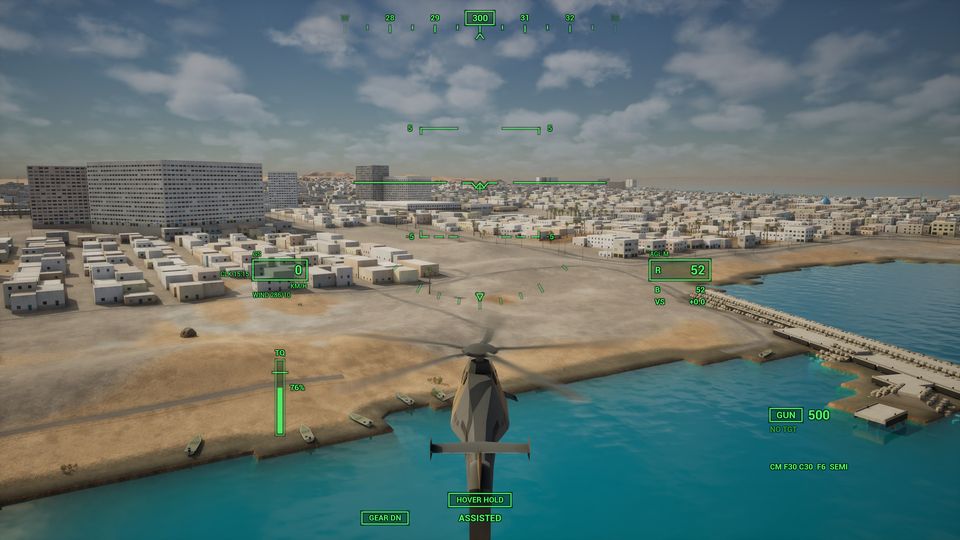 The RAH-66 Comanche seen from behind, flying low along the Qeshm coast towards a town and a pier