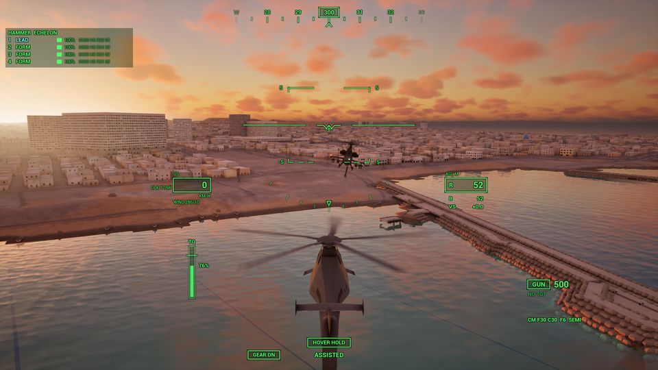 Two helicopters flying in formation at golden hour over a harbour wall